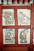 Ladakh - Hemis gompa, painted panels of the lower portico